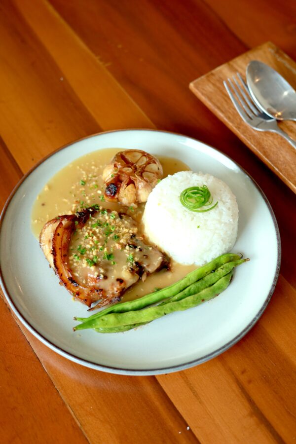 Garlic Confit on Grilled Porkchop